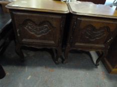 Pair of Oak Pot Cupboards with Carved Doors