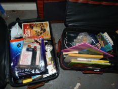 Two Suitcases Containing Books, Binoculars, Kitchenware, etc. and Another