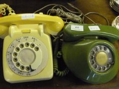 Two Vintage Telephones One Green and One Cream