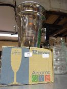 Two Polished Chrome Champagne Buckets and a Box of Flutes