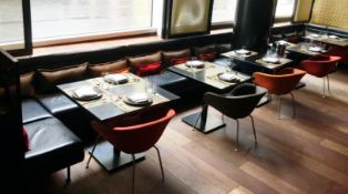 Luxurious High End Seating Booth - Tastefully Furnished in Black Leather with Comfortable
