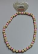 320 x Top Notch Fashion Jewelry Necklaces - Pink Charm and Wooden Design - New and Unused Stock -