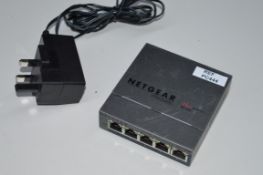1 x Netgear Prosafe Plus 5 Port Ethernet Switch - Model GS105WE - Includes Power Adaptor - CL300 -