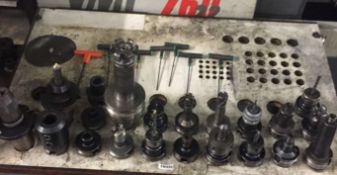 1 x Table Station comprising of approximately 21 Various CNC / VMC Milling Chucks some with various