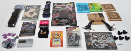 1 x Assorted Collection of Guitar Accessories - Includes Guitar Straps, DVD's, Plectrums, Mini