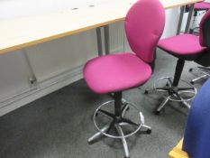 Cloth upholstered high swivel chair with foot rest