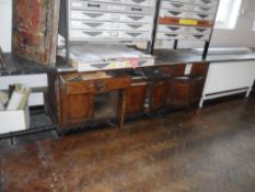 Cupboards and drawers. In sections. Comes apart.