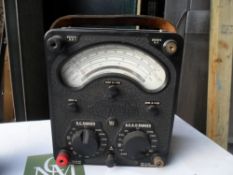 Universal Avometer Model 8. Black plastic. With glass panel at top. A timeless piece of British