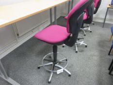 Cloth upholstered high swivel chair with foot rest