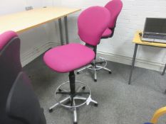 Cloth upholstered high swivel chair with foot rest