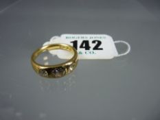 An antique eighteen carat gold three stone diamond ring, hallmarked Birmingham 1891, total diamond