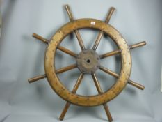 An eight spoke hardwood ship's wheel with iron centre, 110 cms diameter
