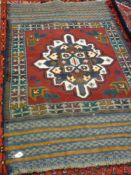 A hand woven Afghan Baluchi tribal rug, part kilim, 156 x 87 cms