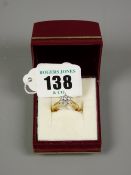 An eighteen carat gold diamond cluster ring set with seven 0.07 carat stones, 3 grms approximate