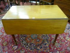 A Victorian mahogany twin flap Pembroke table with single end drawer on turned supports, 73 x 99 cms