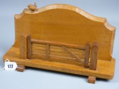 A Bob 'Wrenman' Hunter carved oak letter rack with signature wren to the top, twin post five bar