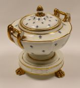 SWANSEA PORCELAIN - rare shaped tureen and cover, raised on a circular base on three gilded claw-