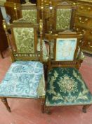 A set of four Edwardian mahogany salon chairs with carved top rail and spindle galleried bottom