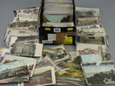 Postcards - a large quantity (shoebox full) of postcards, approximately half plastic sleeved,