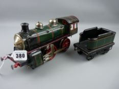 Toys - a Carette wind-up locomotive and tender, marked 'I-48' and 'G.C & Company', total length 40