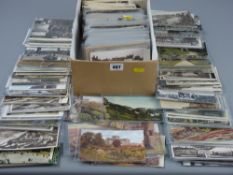 Postcards - a large quantity (shoebox full) of postcards, many plastic sleeved, subjects including
