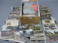 Postcards - a large quantity (shoebox full) of postcards, many plastic sleeved, subjects including