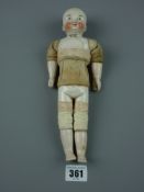 Toys - a Motschmann Sonnerburg Taufling type doll, male painted porcelain face, (chest damaged),