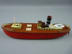 Toys - a German wind-up ship with black funnel and label 'Spielwaren Antonriesch'