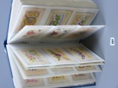 Postcards - an album of approximately thirty six World War I silk postcards