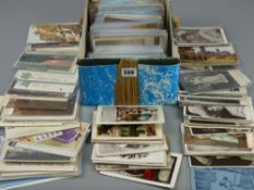 Postcards - a large quantity (shoebox full) of postcards, many plastic sleeved, subject including