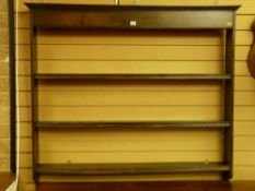 An antique oak three shelf open Delft rack with plain moulded top frieze, 120 x 127 cms