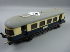 Toys - a wind-up tinplate train, blue and cream coloured after 'Ditmar', 29 cms long