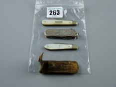 Fruit knives - two mother of pearl backed silver fruit knives, one in a leather case with a bright