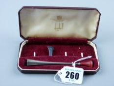 A cased Dunhill trumpet shaped silver cigarette holder with spare mouthpiece, Birmingham 1953