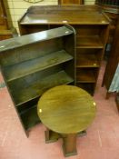 A mahogany four shelf railback bookcase, an oak four shelf bookcase and a circular topped oak side