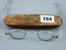 Spectacles - a pair of silver framed spectacles in a leather and wooden case