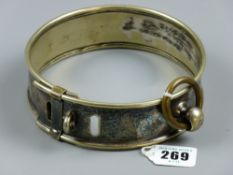 A 19th Century white metal dog collar, adjusting band with padlock loop and tethering ring, 14.5 cms