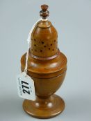 An early 19th Century treen sycamore Muffineer with turned finial, 14 cms high (two splits in cap)