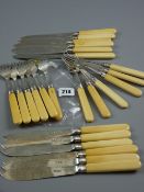 A set of twelve silver bladed fish knives and forks with ivory handles, London 1899