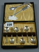A cased set of six silver teaspoons, Sheffield 1920 with Corinthian column handles and a pair of