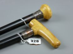 Two ebony walking canes with bone/ivory tops and hallmarked silver bands, 91.5 cms the longest