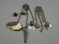 A Victorian silver chatelaine, the hallmarked clip for Birmingham 1894 having three extending chains