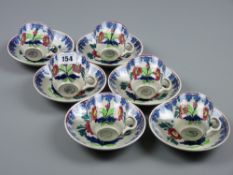 A set of six Portneuf pottery spongeware cups and saucers, stamped to the base 'Auld Heather Ware,