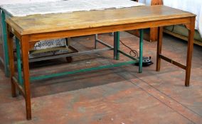 A vintage side table on four corner supports, 181cms wide