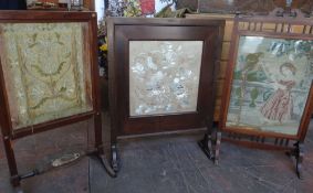 Three various fire screens, one of architectural form and another with padded footrest