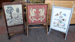 Three various fire screens, one on lyre supports