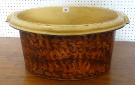 A sponged metallic farmhouse twin handled basin, 50cms wide