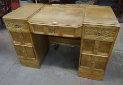 A lightwood kneehole Jacobean revival dressing table