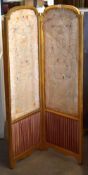 A two fold antique dressing screen, silk floss applied and lace-work