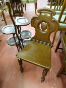 A Victorian mahogany hall chair with carved and pierced back (care needed, loose back) and an